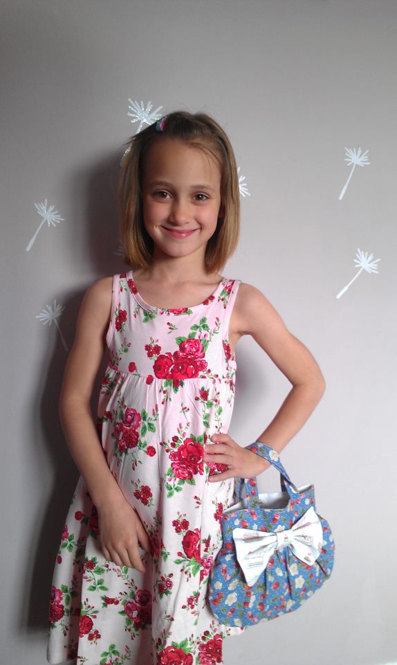 Anna Chocola's Millinery Customer Wearing A Hat