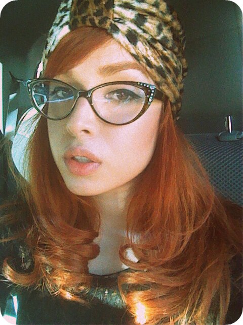 Anna Chocola's Millinery Customer Wearing A Hat