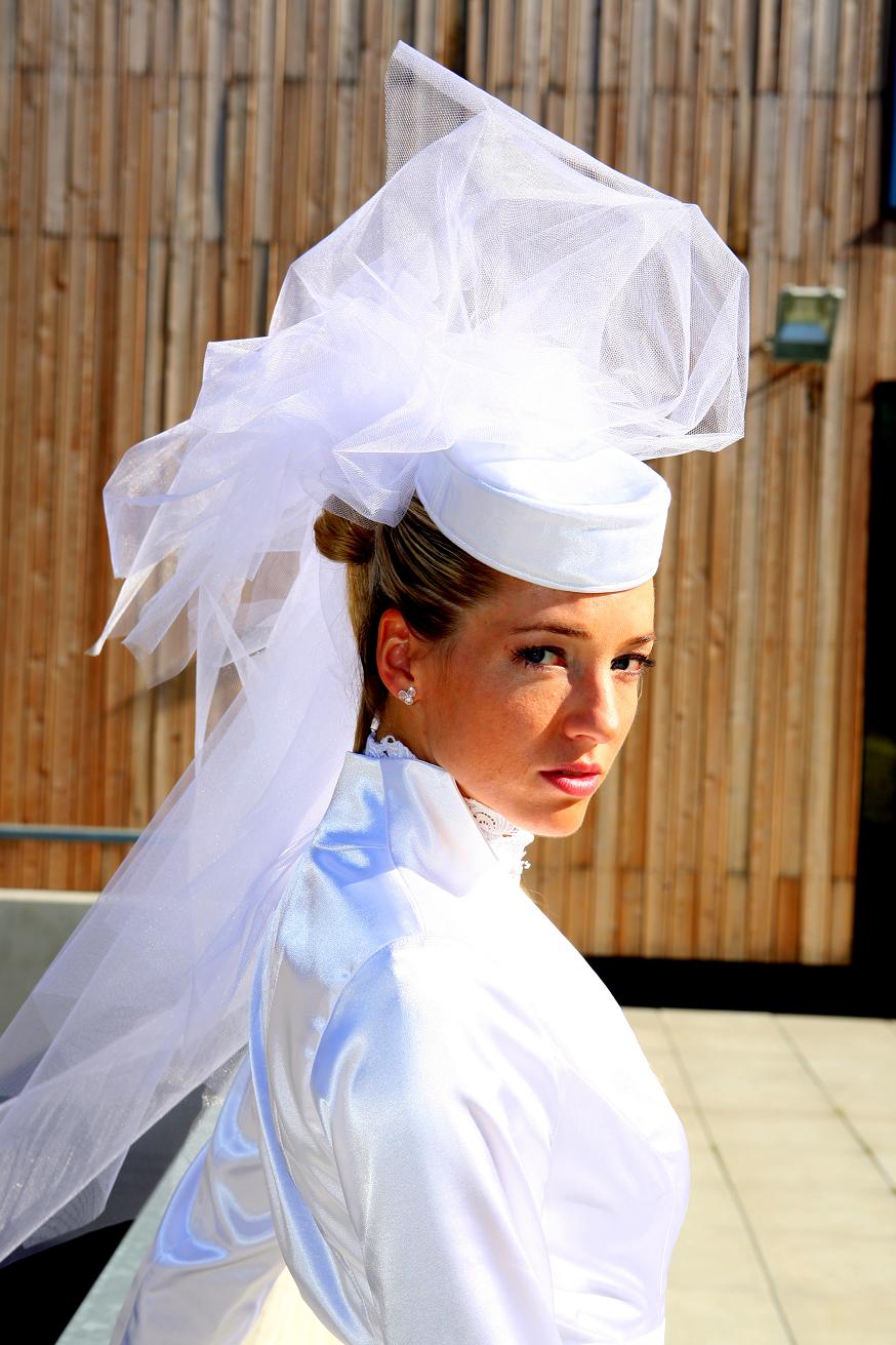 Anna Chocola's Millinery Customer Wearing A Hat