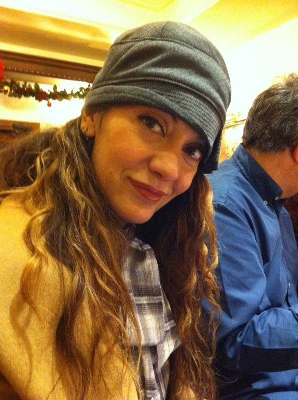 Anna Chocola's Millinery Customer Wearing A Hat