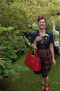 Anna Chocola's Millinery Customer Wearing A Hat