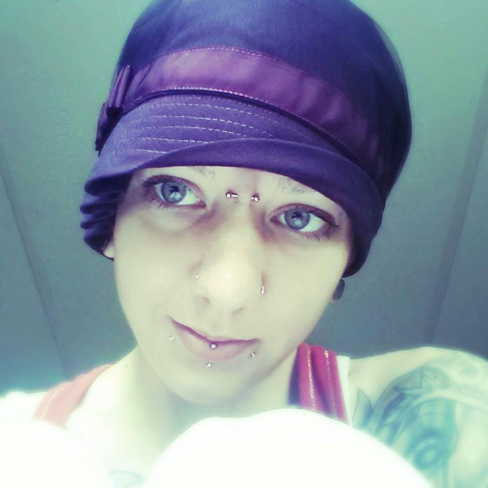 Anna Chocola's Millinery Customer Wearing A Hat