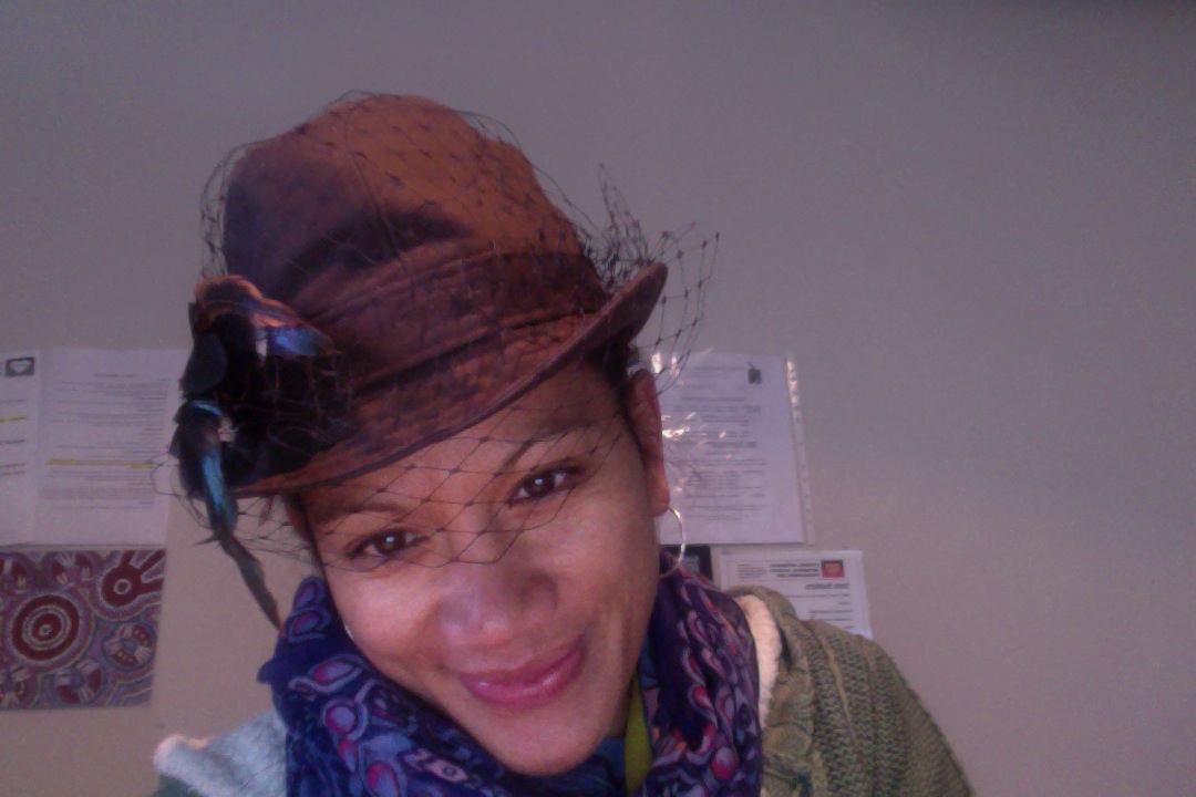 Anna Chocola's Millinery Customer Wearing A Hat
