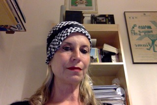 Anna Chocola's Millinery Customer Wearing A Hat