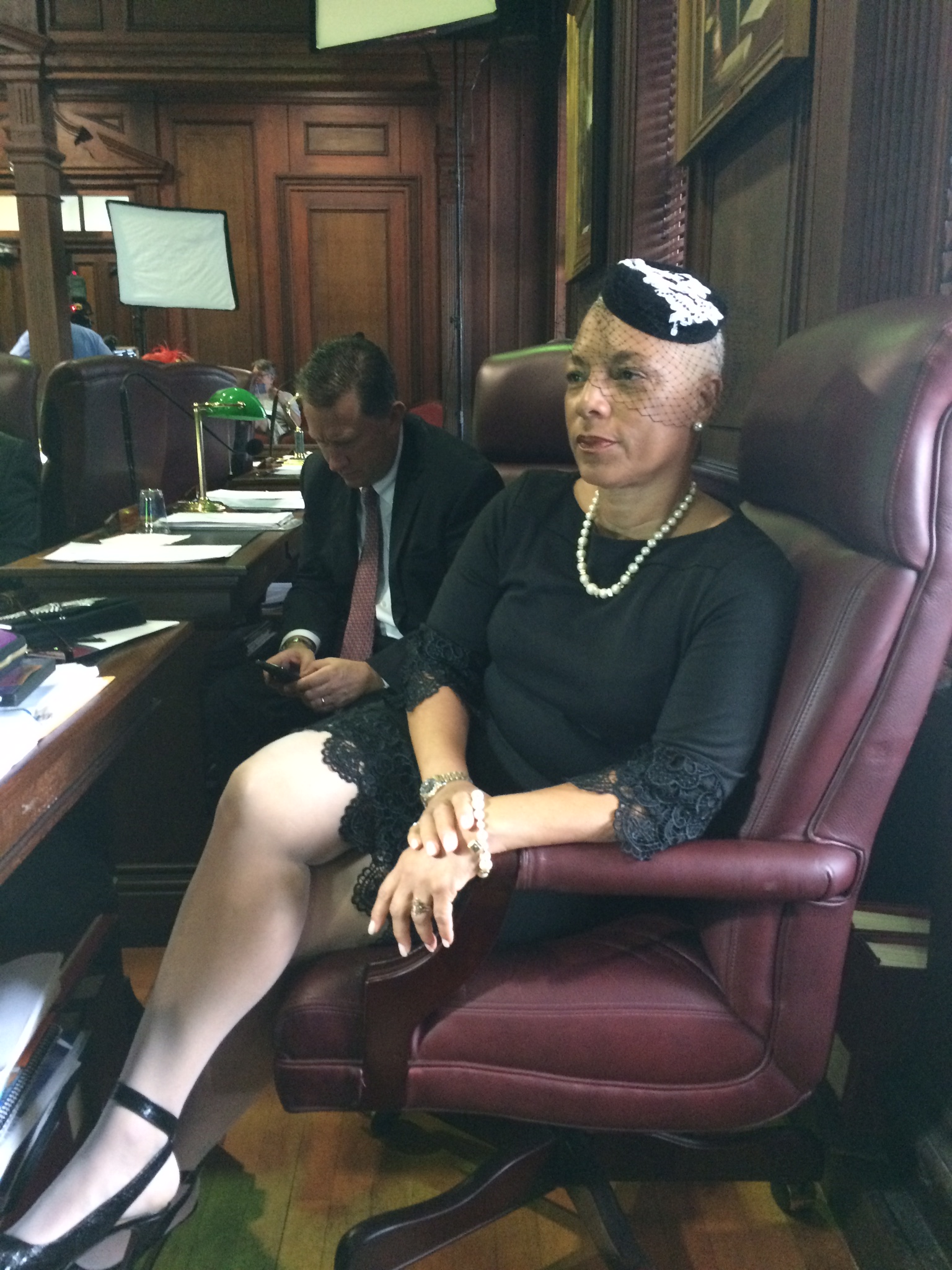 Anna Chocola's Millinery Customer Wearing A Hat