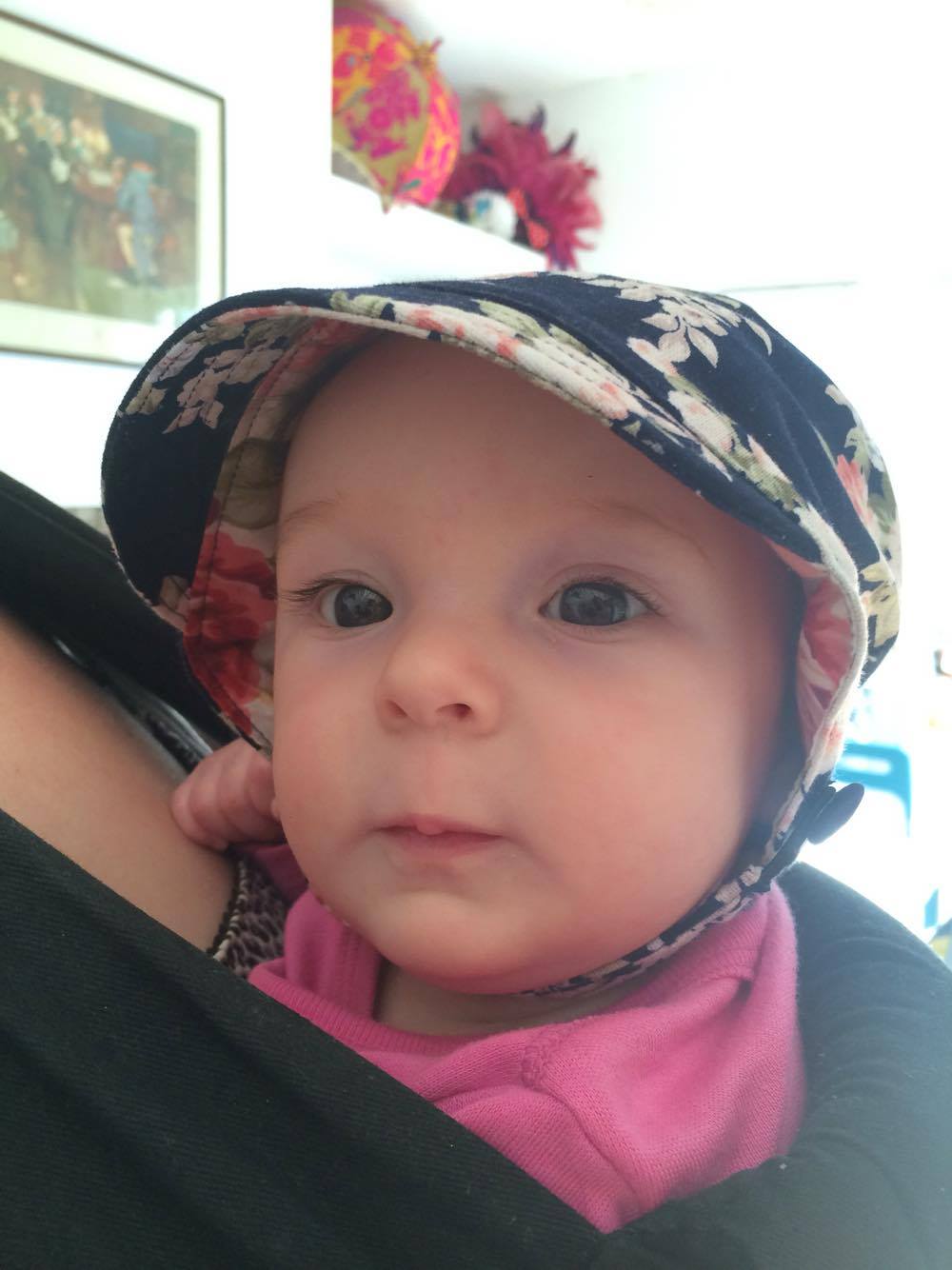 Anna Chocola's Millinery Customer Wearing A Hat